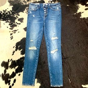 Brand new boutique button up skinny jeans